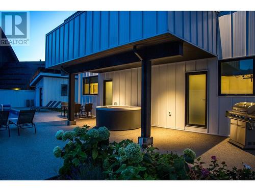 Pool Area at Dusk - 2043 Airport Way, Revelstoke, BC - Outdoor With Exterior