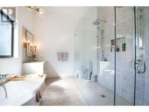 Primary Ensuite with Custom Shower, Dual Vanities and Freestanding Tub - 2043 Airport Way, Revelstoke, BC - Indoor Photo Showing Bathroom