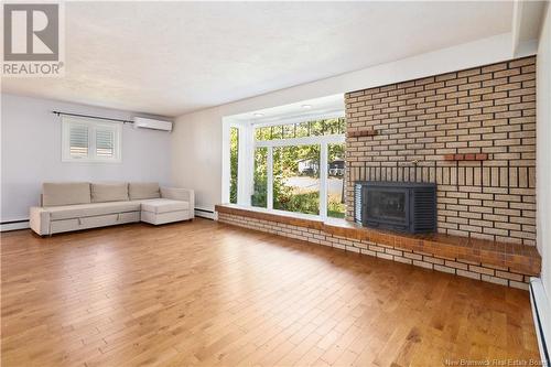 20 Vista Drive, Moncton, NB - Indoor Photo Showing Living Room With Fireplace