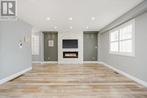 567 Sanderson Crescent, Milton, ON - Indoor Photo Showing Other Room With Fireplace