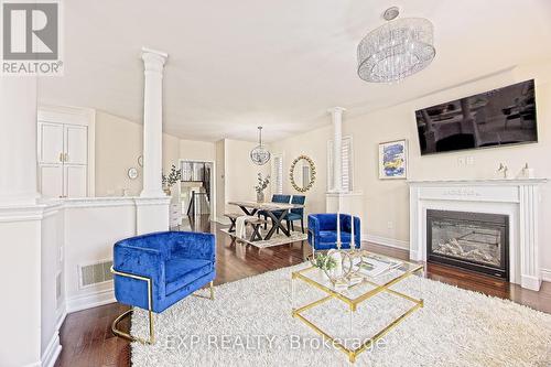 75 Learmont Avenue W, Caledon, ON - Indoor Photo Showing Living Room With Fireplace