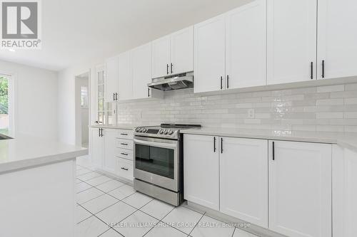 64 Harpin Way E, Centre Wellington (Fergus), ON - Indoor Photo Showing Kitchen With Upgraded Kitchen