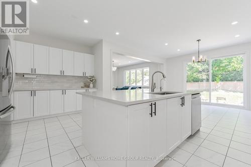 64 Harpin Way E, Centre Wellington (Fergus), ON - Indoor Photo Showing Kitchen With Upgraded Kitchen