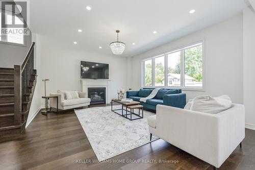 64 Harpin Way E, Centre Wellington (Fergus), ON - Indoor Photo Showing Living Room With Fireplace