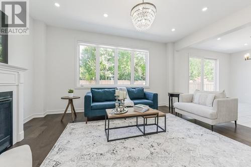 64 Harpin Way E, Centre Wellington (Fergus), ON - Indoor Photo Showing Living Room With Fireplace