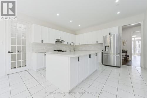 64 Harpin Way E, Centre Wellington (Fergus), ON - Indoor Photo Showing Kitchen With Upgraded Kitchen