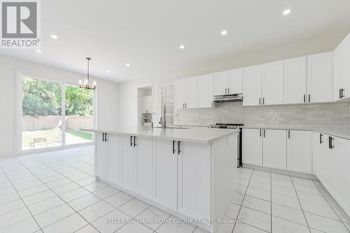 64 Harpin Way E, Centre Wellington (Fergus), ON - Indoor Photo Showing Kitchen With Upgraded Kitchen