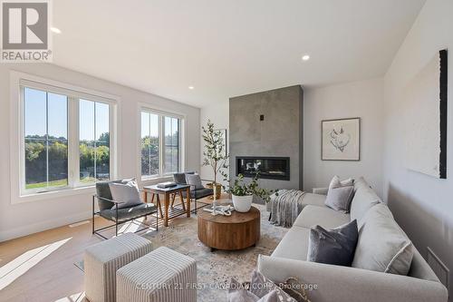 122 Timberwalk Trail, Middlesex Centre (Ilderton), ON - Indoor Photo Showing Living Room With Fireplace