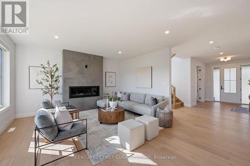 122 Timberwalk Trail, Middlesex Centre (Ilderton), ON - Indoor Photo Showing Living Room With Fireplace