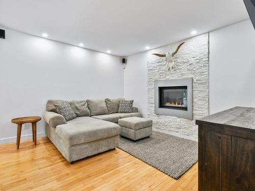 Salon - 625 Rue La Bruyère, Laval (Auteuil), QC - Indoor Photo Showing Living Room With Fireplace