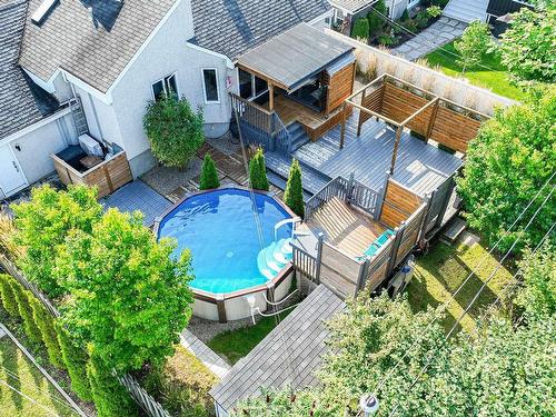 Backyard - 170 Carré De Chinon, Terrebonne (Lachenaie), QC - Outdoor With Above Ground Pool