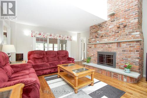 35 Castle Harbour Drive, Scugog (Port Perry), ON - Indoor Photo Showing Living Room With Fireplace