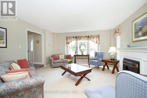 35 Castle Harbour Drive, Scugog (Port Perry), ON - Indoor Photo Showing Living Room With Fireplace