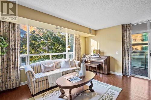 212 - 55 The Boardwalk Way, Markham, ON - Indoor Photo Showing Living Room