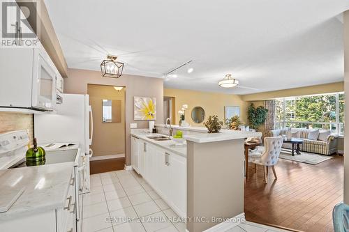 212 - 55 The Boardwalk Way, Markham (Greensborough), ON - Indoor Photo Showing Kitchen With Double Sink