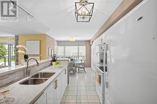 212 - 55 The Boardwalk Way, Markham, ON - Indoor Photo Showing Kitchen With Double Sink