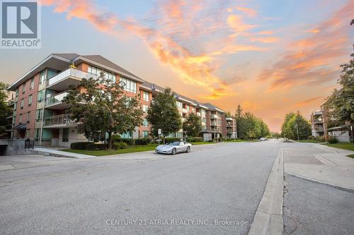 212 - 55 The Boardwalk Way, Markham, ON - Outdoor With Balcony With Facade