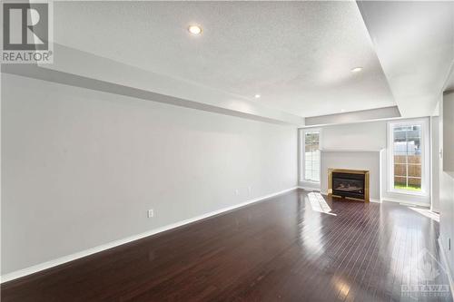 133 Braddock Private, Ottawa, ON - Indoor Photo Showing Living Room With Fireplace