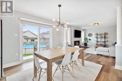 12 Circlewood Drive, St. Thomas, ON - Indoor Photo Showing Dining Room With Fireplace