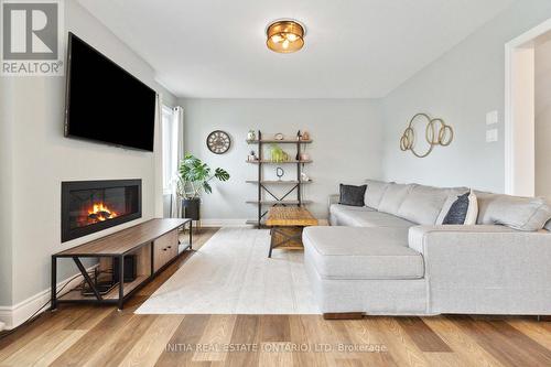 12 Circlewood Drive, St. Thomas, ON - Indoor Photo Showing Living Room With Fireplace