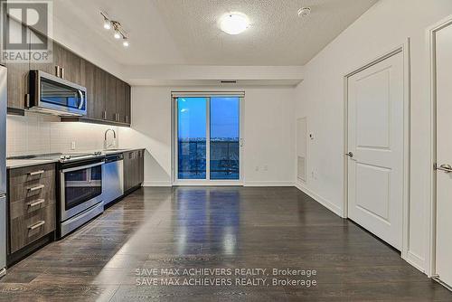 921 - 8 Nahani Way, Mississauga, ON - Indoor Photo Showing Kitchen