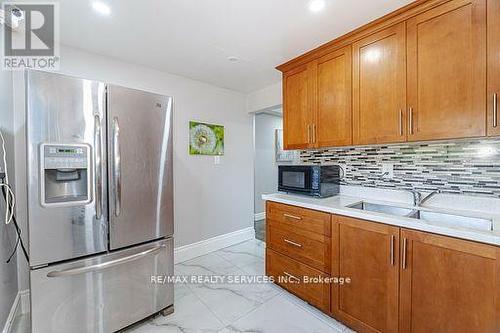 89 Darras Court E, Brampton, ON - Indoor Photo Showing Kitchen With Double Sink