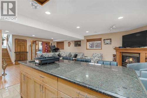 4162 Spago Crescent, Windsor, ON - Indoor Photo Showing Kitchen With Fireplace