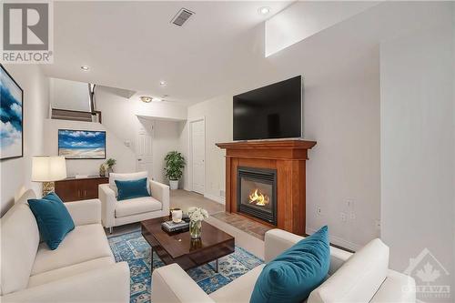 81 Indigo Street, Ottawa, ON - Indoor Photo Showing Living Room With Fireplace