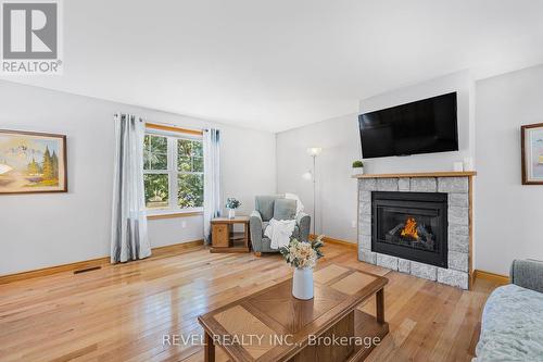 22 Anne Street, Penetanguishene, ON - Indoor Photo Showing Living Room With Fireplace