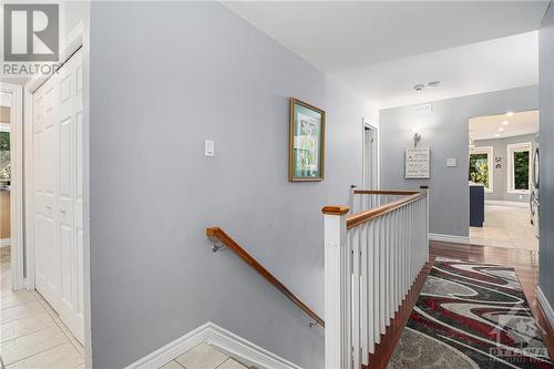 Hallway to laundry and garage entrance - 1114 Morin Road, Cumberland, ON 