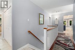 Hallway to laundry and garage entrance - 