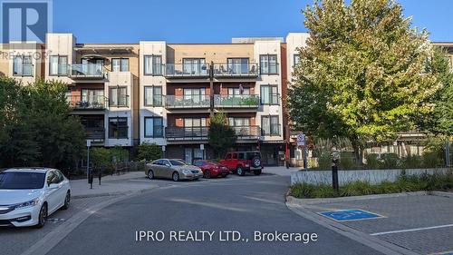 203 - 5025 Harvard Road, Mississauga, ON - Outdoor With Balcony With Facade