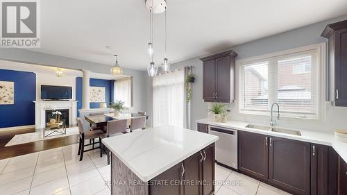 9 Pellegrino Road, Brampton, ON - Indoor Photo Showing Kitchen With Fireplace With Double Sink