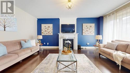 9 Pellegrino Road, Brampton, ON - Indoor Photo Showing Living Room With Fireplace