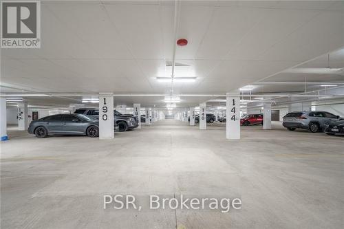 1213 - 450 Dundas Street E, Hamilton (Waterdown), ON - Indoor Photo Showing Garage