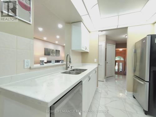 317 - 1400 The Esplanade N, Pickering, ON - Indoor Photo Showing Kitchen With Double Sink