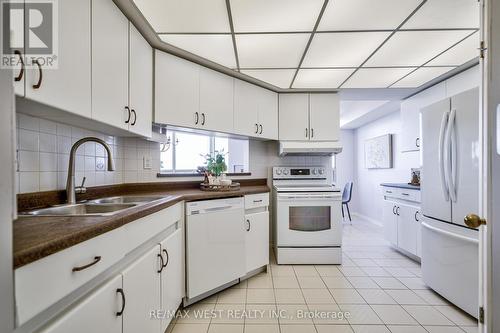 1009 - 310 Mill Street S, Brampton, ON - Indoor Photo Showing Kitchen With Double Sink