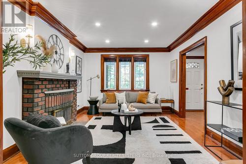 39 Mayfield Avenue, Toronto (High Park-Swansea), ON - Indoor Photo Showing Living Room With Fireplace