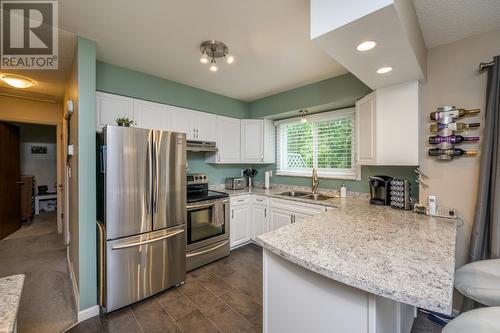 7668 Lemoyne Drive, Prince George, BC - Indoor Photo Showing Kitchen With Double Sink