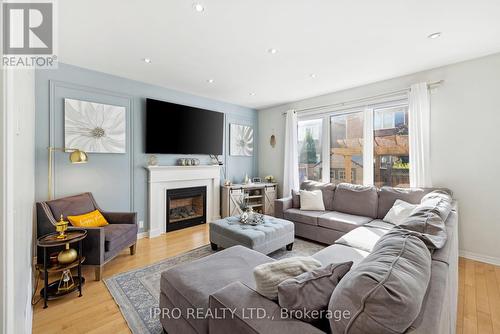 129 Willet Terrace, Milton, ON - Indoor Photo Showing Living Room With Fireplace