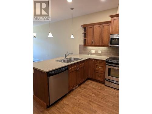 9100 Mackie Drive Unit# 104, Coldstream, BC - Indoor Photo Showing Kitchen With Double Sink