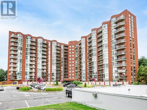 1115 - 20 Dean Park Road, Toronto (Rouge), ON - Outdoor With Balcony With Facade