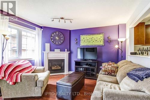 11 - 2880 Headon Forest Drive, Burlington, ON - Indoor Photo Showing Living Room With Fireplace