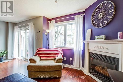 11 - 2880 Headon Forest Drive, Burlington, ON - Indoor Photo Showing Living Room With Fireplace