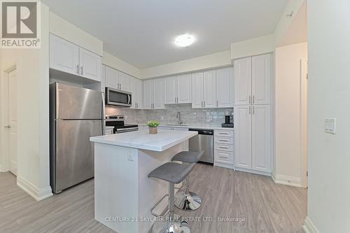 304 - 65 Yorkland Boulevard, Brampton (Goreway Drive Corridor), ON - Indoor Photo Showing Kitchen With Upgraded Kitchen