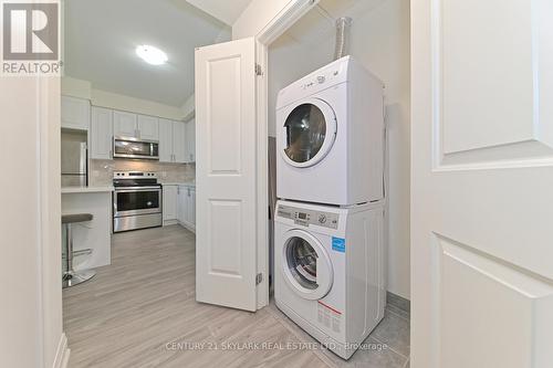 304 - 65 Yorkland Boulevard, Brampton (Goreway Drive Corridor), ON - Indoor Photo Showing Laundry Room