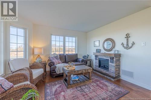 6642 Route 11, Clifton, NB - Indoor Photo Showing Living Room With Fireplace