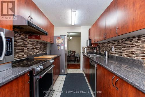 204 - 18 Knightsbridge Road, Brampton, ON - Indoor Photo Showing Kitchen With Double Sink