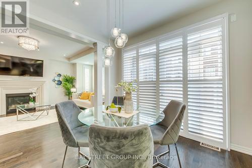 369 Dahlia Trail, Oakville, ON - Indoor Photo Showing Dining Room With Fireplace