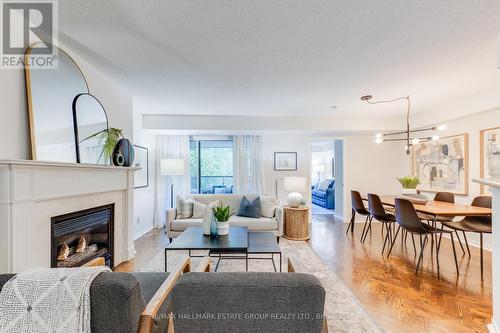 202 - 38 Avoca Avenue, Toronto (Rosedale-Moore Park), ON - Indoor Photo Showing Living Room With Fireplace